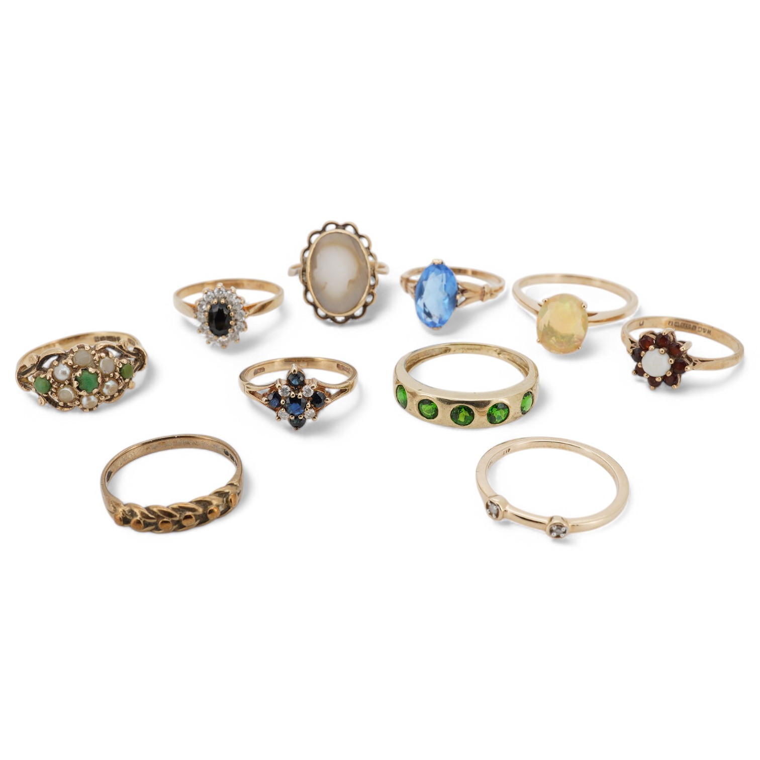 A group of assorted modern 9ct and gem set rings including opal and seed pearl and turquoise and one other 10k ring. Condition - fair to good